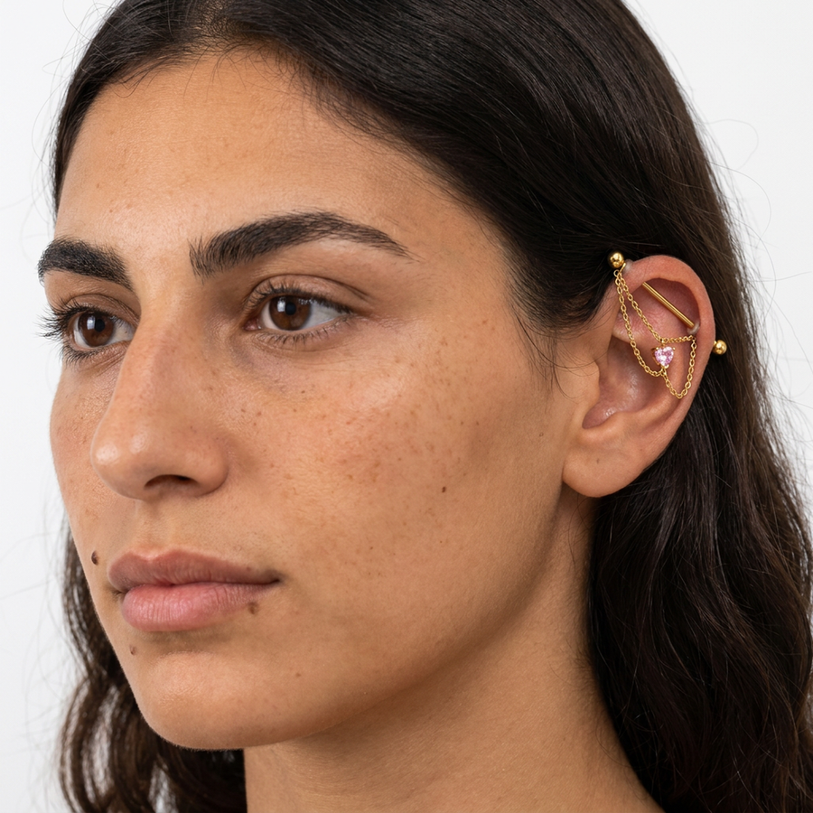 Piercing con catena e pietra rosa in Titanio G23 - Piercing per Industrial