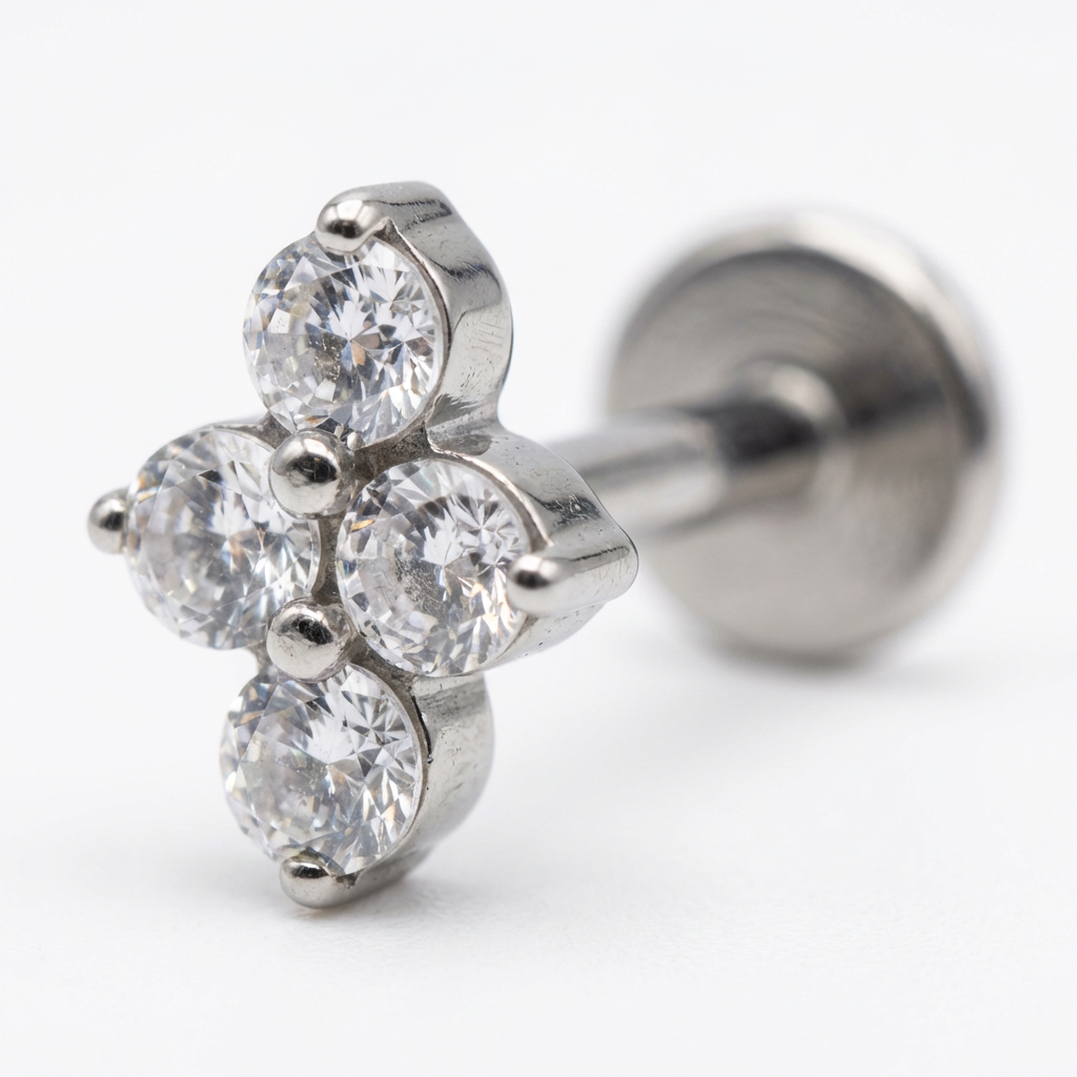 Piericng con quattro zirconi in Titanio G23 - Piercing per lobo, helix, forward helix, conch, flat, tragus