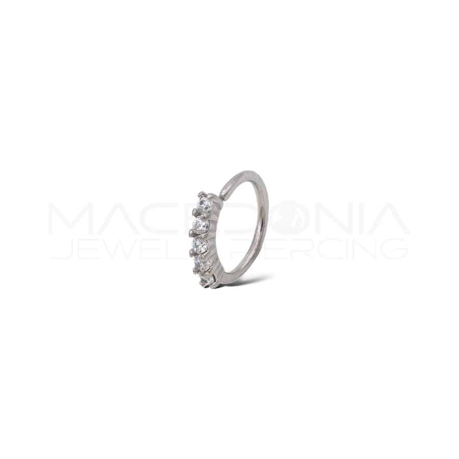 Piercing con apertura laterale in acciaio chirurgico 316L con corona di zirconi