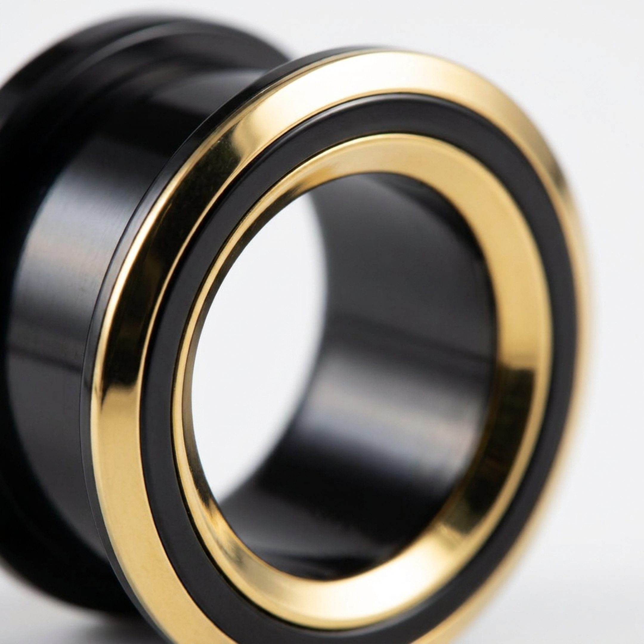 Dilatatore nero con doppia fascia oro in Acciaio Inox  - Piercing per Lobo