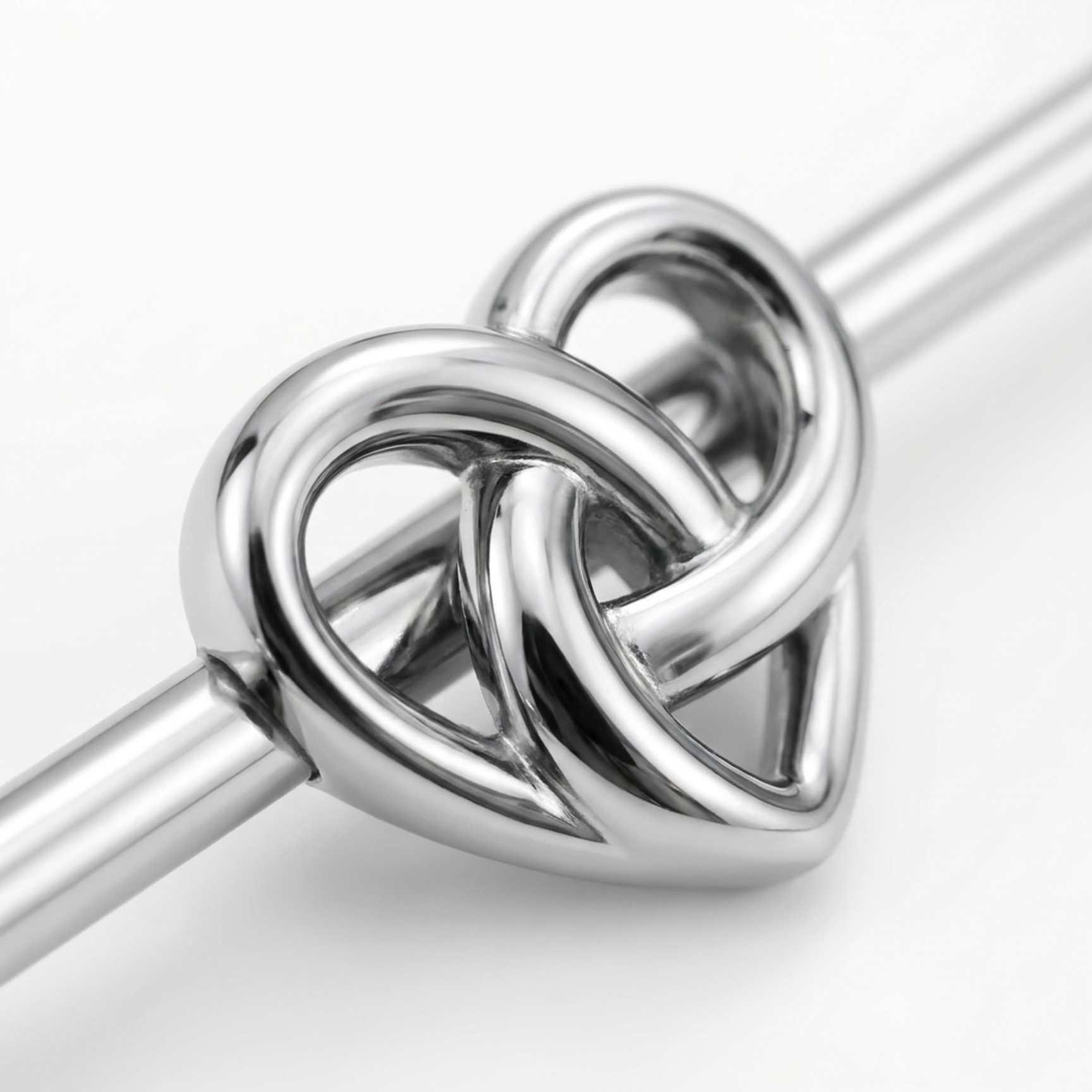 Piercing con cuore annodato in Acciaio Chirurgico 316L - Piercing per industrial