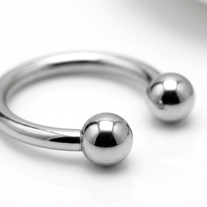 Piercing in acciaio chirurgico 316L con design a palline di colore argento
