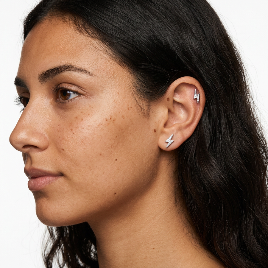 Piercing in acciaio chirurgico 316L a forma di fulmine con zirconi incastonati