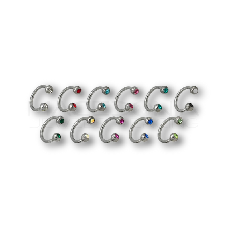 Piercing in acciaio chirurgico 316L con pallina da 3 mm e brillantini incastonati