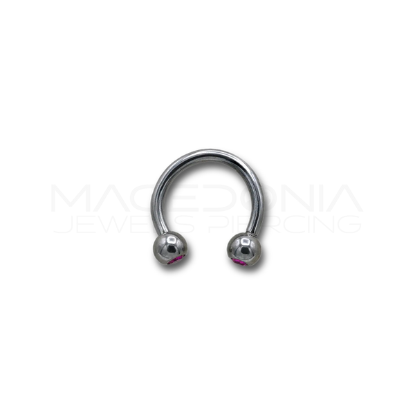 Piercing in acciaio chirurgico 316L con pallina da 3 mm e brillantini incastonati