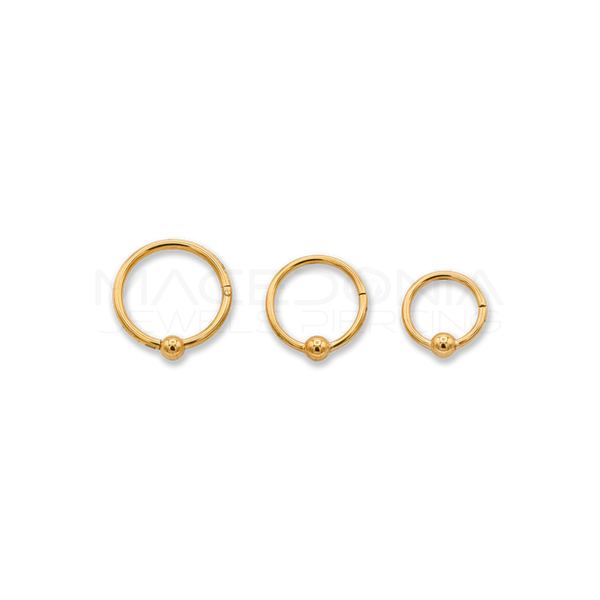 Piercing clicker con pallina in acciaio chirurgico 316L, colore oro