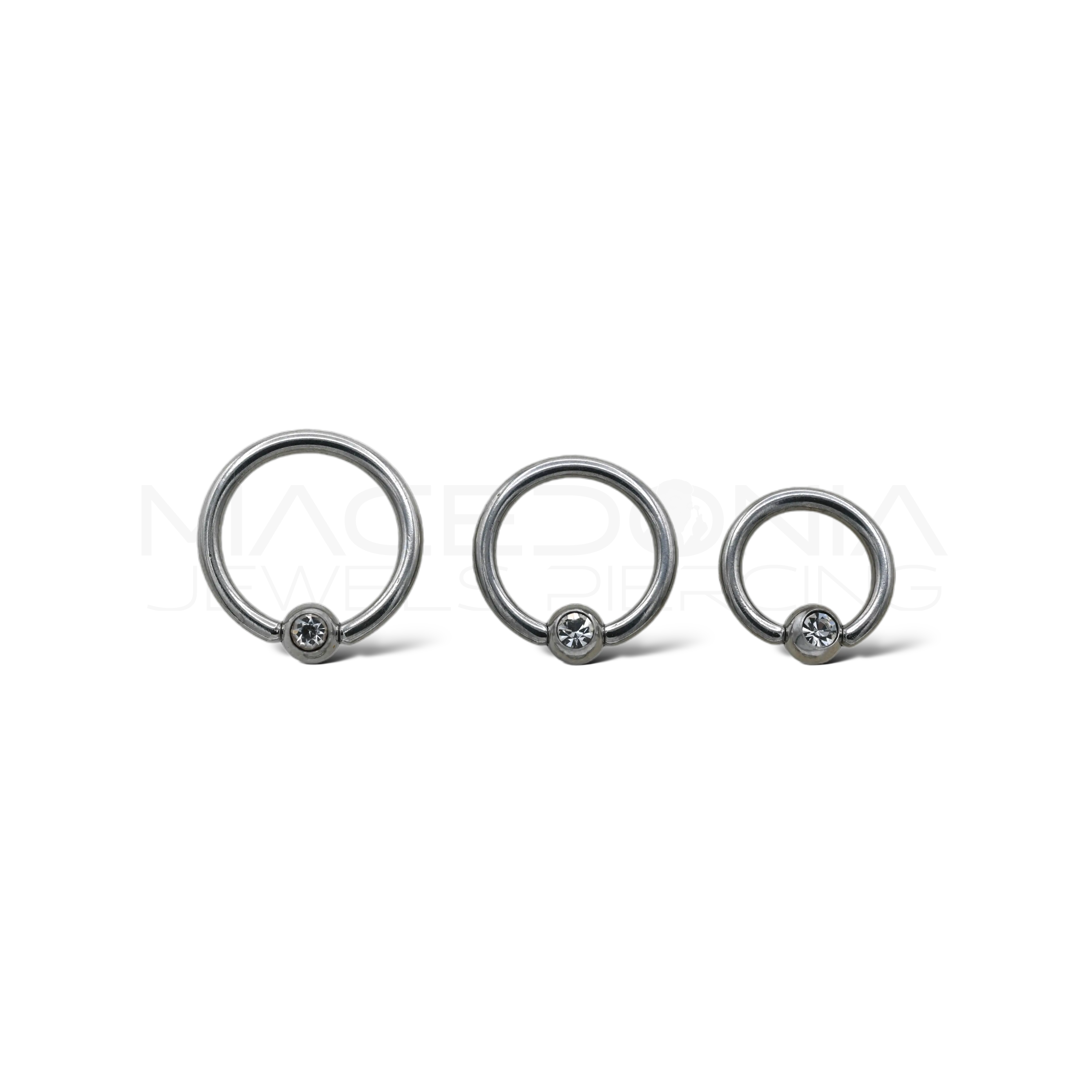 PIERCING A CERCHIO CON PALLINA E ZIRCONE A INCASTRO