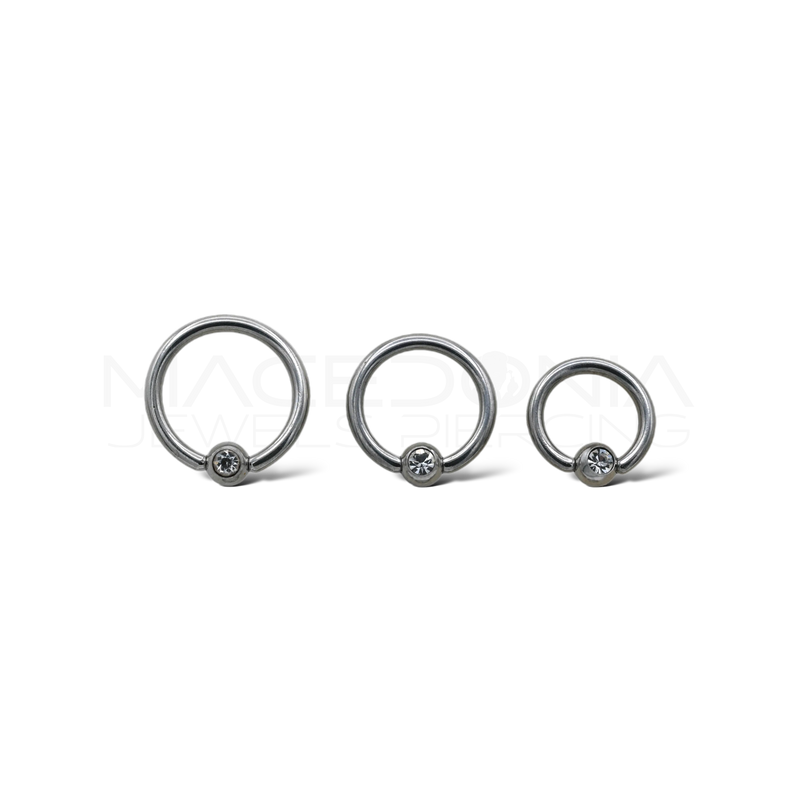 Piercing a incastro in acciaio chirurgico 316L con pallina e zircone, colore argento