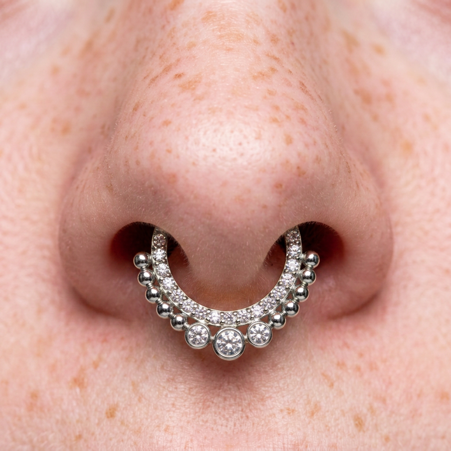 Macro-titanium-piercing-with-orange-tips-2026-08-31-14-30-16-7e3f71cf.png