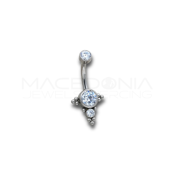 Piercing ombelico a banana in titanio F136 con triangolo ricoperto di zirconi