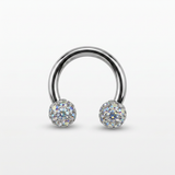 Piercing in acciaio chirurgico 316L con palline glitterate