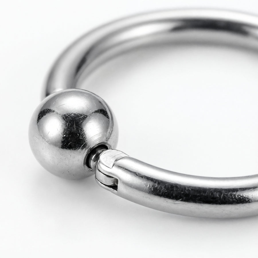 Cerchietto clicker con pallina in Titanio F136 - Piercing per orecchio, naso, labbra, sopracciglio