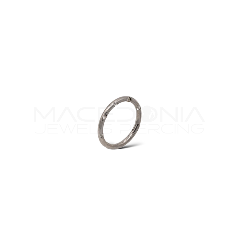 Piercing clicker in acciaio chirurgico 316L con zirconi incastonati