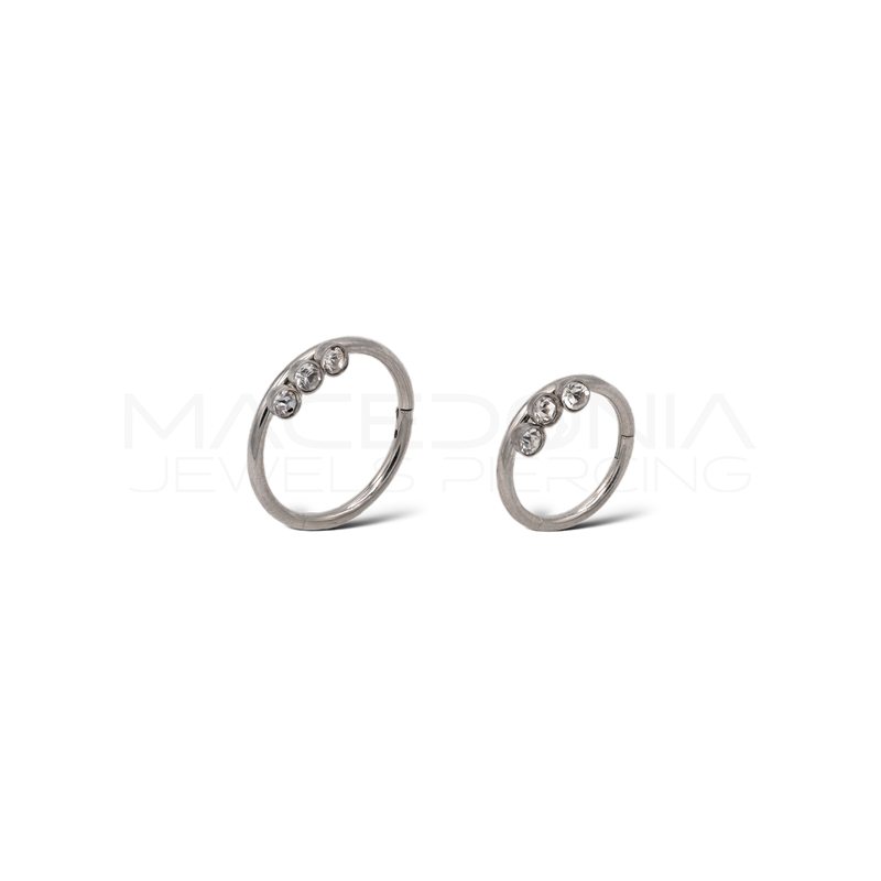 Piercing in acciaio chirurgico 316L con tre zirconi incastonati