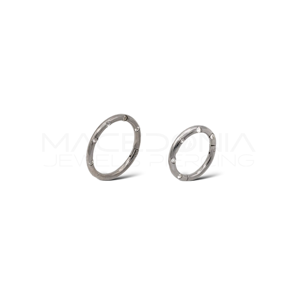 Piercing clicker in acciaio chirurgico 316L con zirconi incastonati