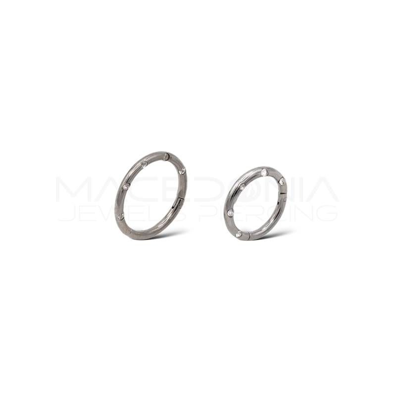 Piercing clicker in acciaio chirurgico 316L con zirconi incastonati