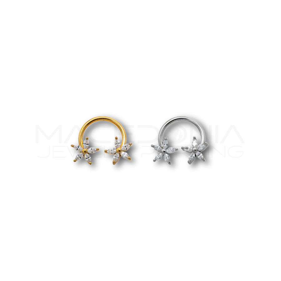 Piercing con fiori impreziositi da zirconi incastonati