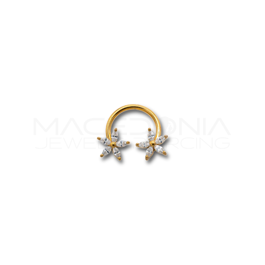 Piercing con fiori impreziositi da zirconi incastonati