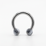 Piercing in acciaio chirurgico 316L con palline trasparenti a righe da 3 mm